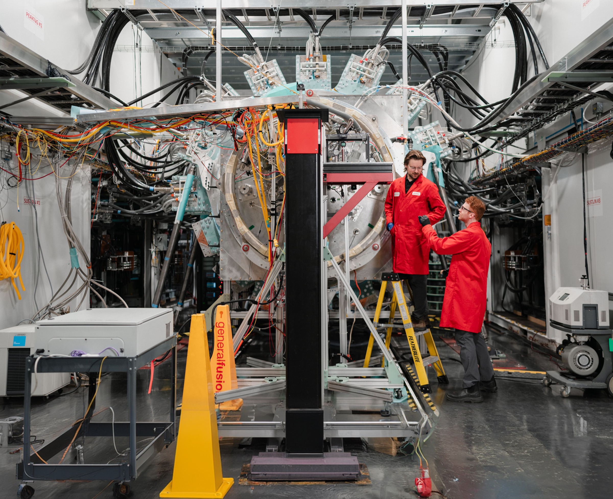 General Fusion team members working on LM26, the company's large-scale Magnetized Target Fusion demonstration machine
