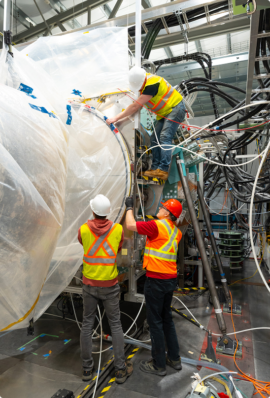 General Fusion team members assembling the LM26 Magnetized Target Fusion demonstration machine